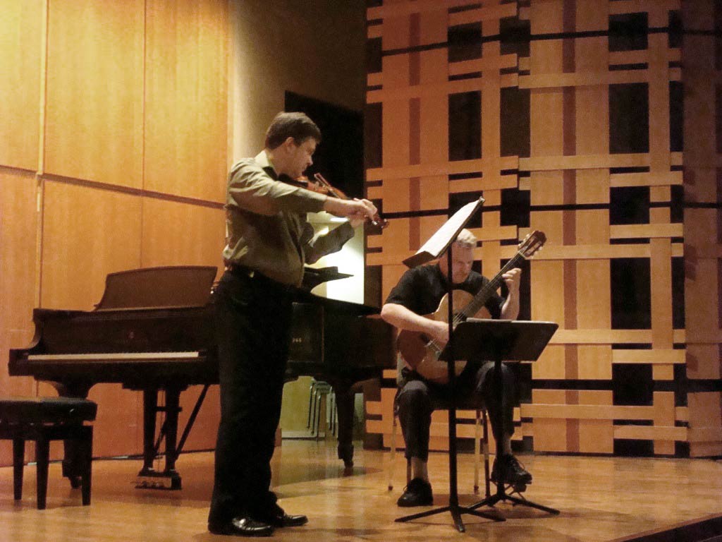 Eric Lawson and Jeff Anvinson performing Mahle's Sonata for Violin and Guitar onstage at Rock Hall, Philadelphia